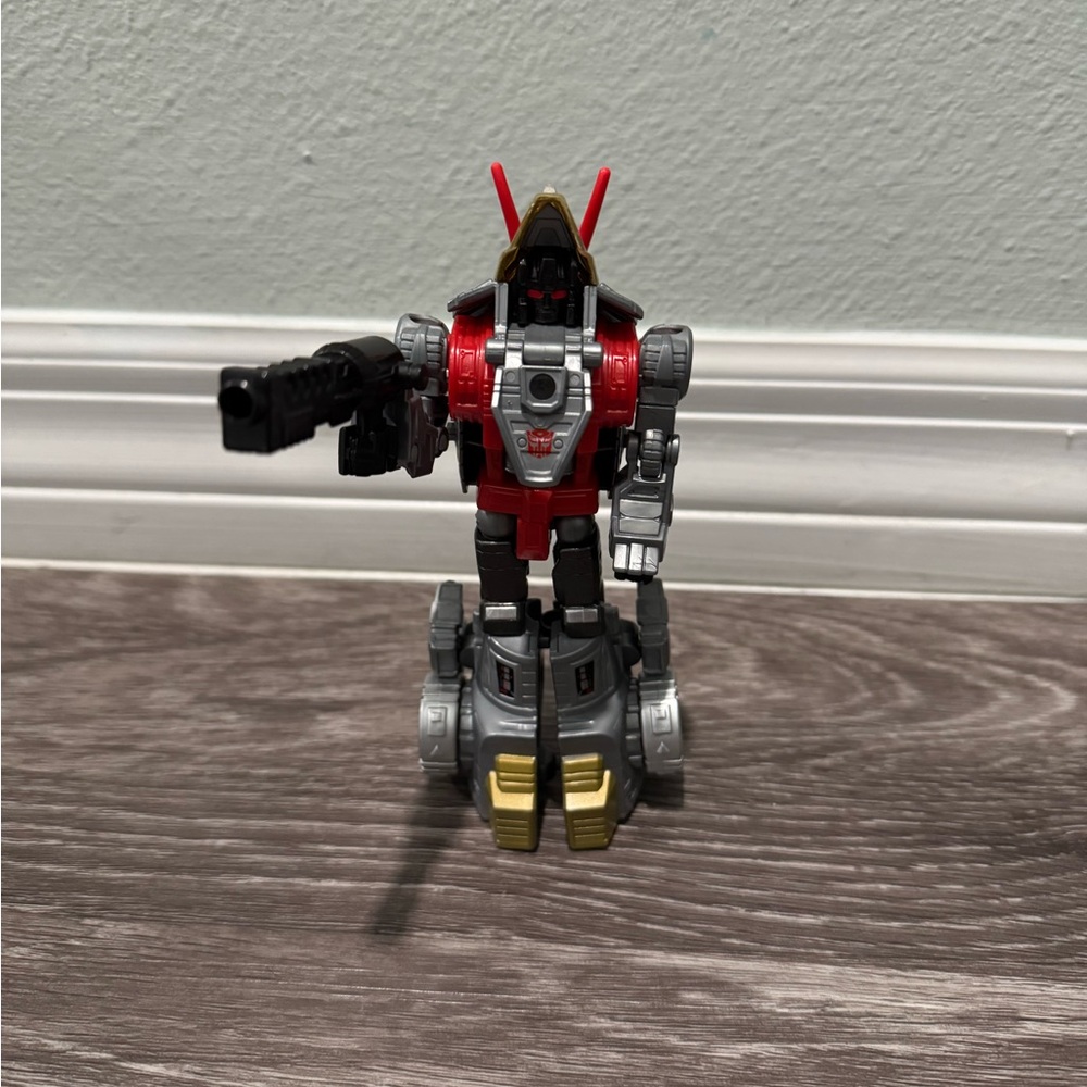 Transformers: Generations Power of the Primes Deluxe Class Dinobot Slug